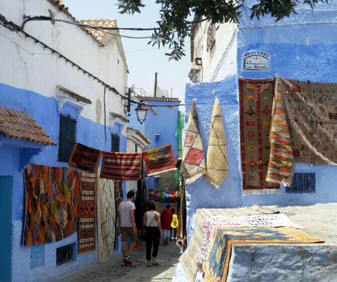 couple in blue streets chaouen