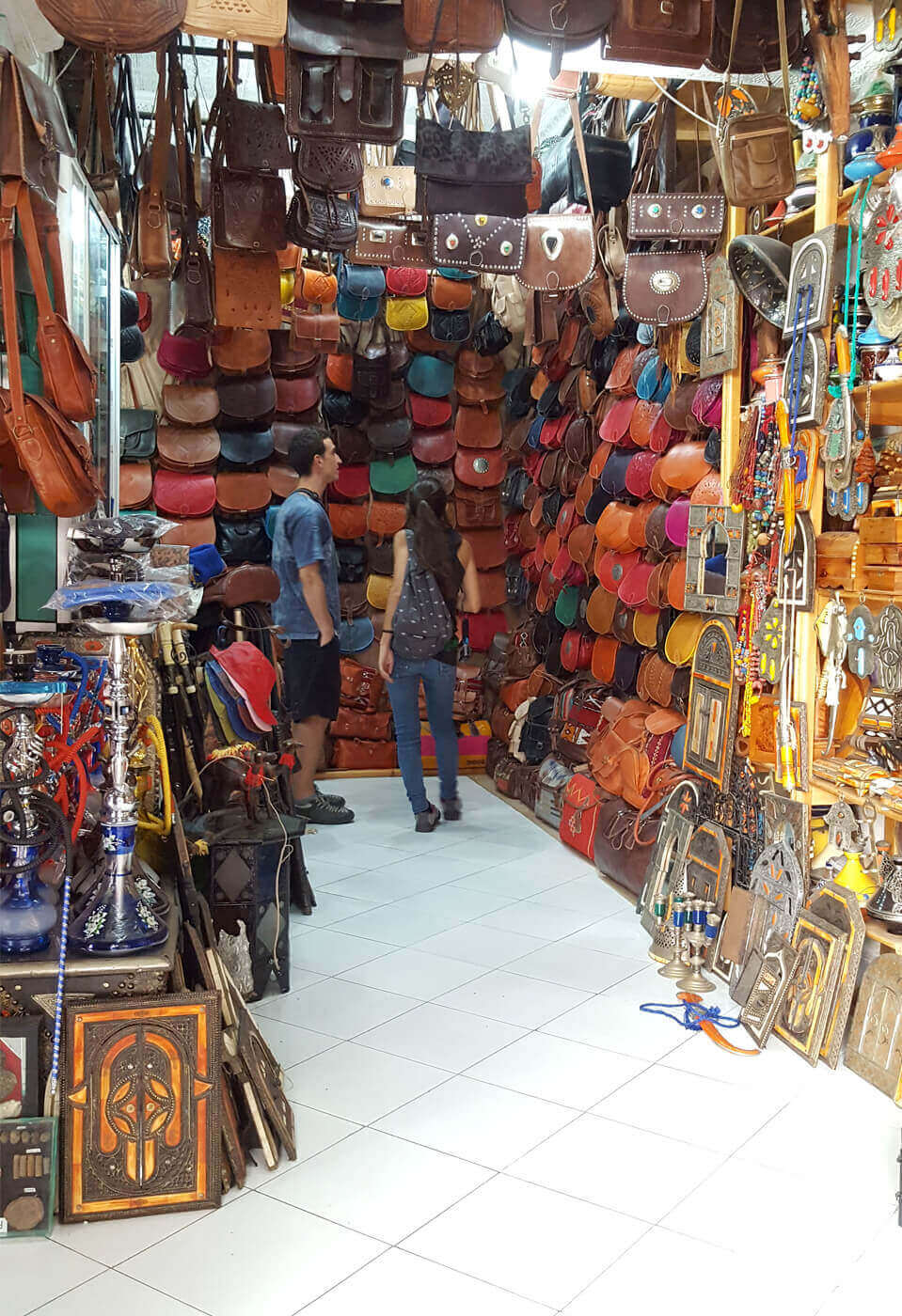 couple in leather moroccan shop